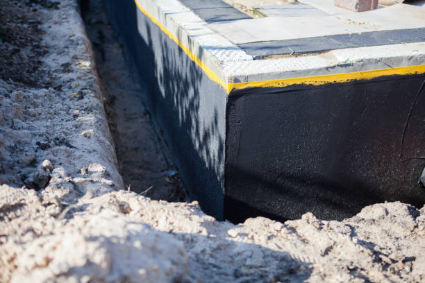 Professional Basement Waterproofing technician working in Jeffersonton, VA